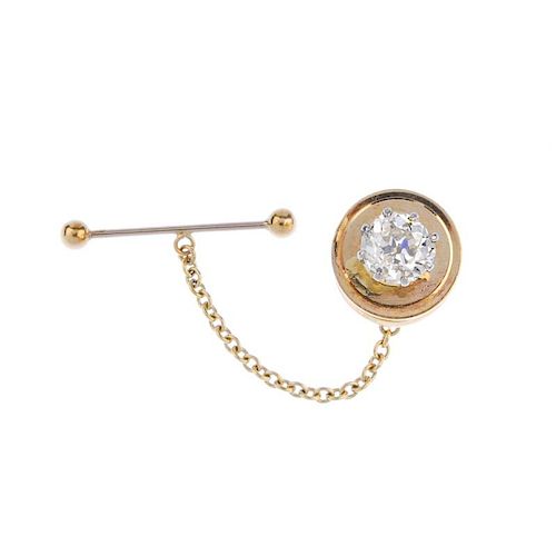 (541052-1-A) A 9ct gold diamond tie pin. The old-cut diamond, to the plain disc with grooved edge. E
