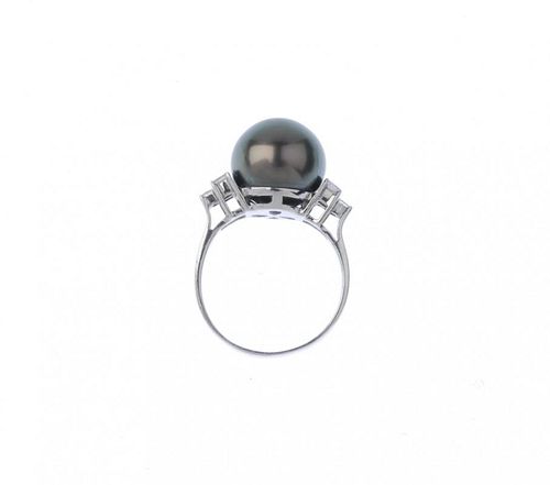 (541094-2-A) A diamond and cultured pearl ring. The grey cultured pearl, measuring 12.8mms, to the s