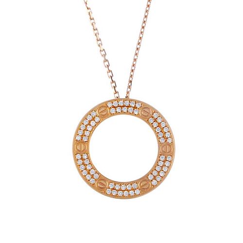 (541392-1-A) CARTIER - a diamond 'love' pendant. The pave-set diamond circle, with screw head highli