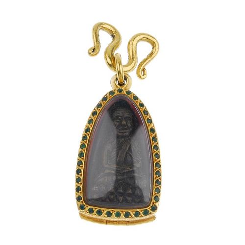 (541623-1-A) Two pendants and a necklace. Each pendant designed as a miniature idol, enclosed within