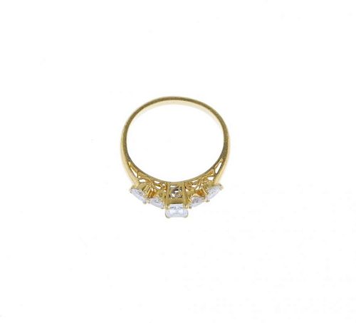 (541623-3-A) A diamond dress ring. The rectangular-shape diamond, with graduated heart-shape diamond