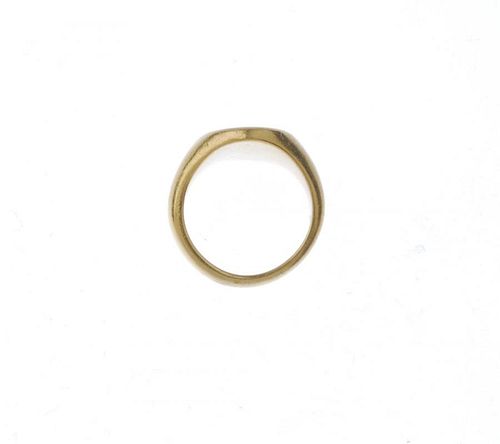 (544516-10-A) An 18ct gold signet ring. The oval-shape panel, with castle turret crest seal, to the
