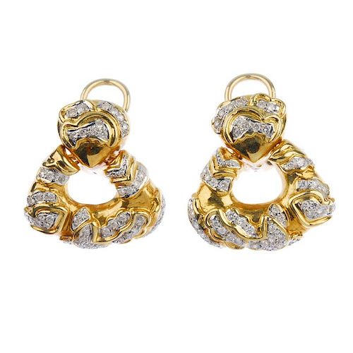 (117589) A pair of diamond ear pendants. Each designed as brilliant-cut diamonds within an open-work