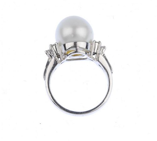 (117589) A cultured-pearl and diamond dress ring. The cultured pearl measuring approximately 11.8mms