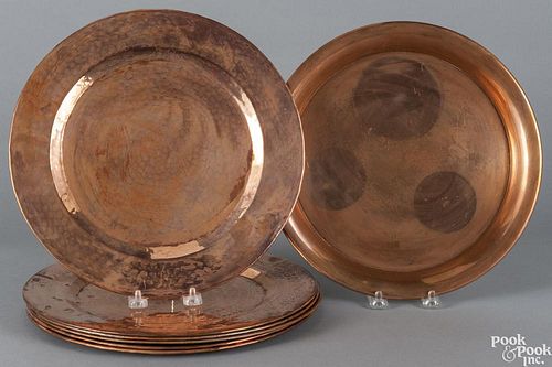 Seven copper chargers, 20th c., 12'' dia.