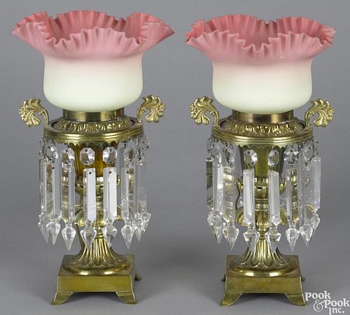 Pair of Burmese glass lamps, late 19th c., with a brass base and prism surround, 14 3/4'' h.