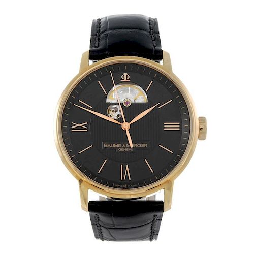 BAUME & MERCIER - a gentleman's Classima wrist watch. 18ct rose gold case with exhibition case back.