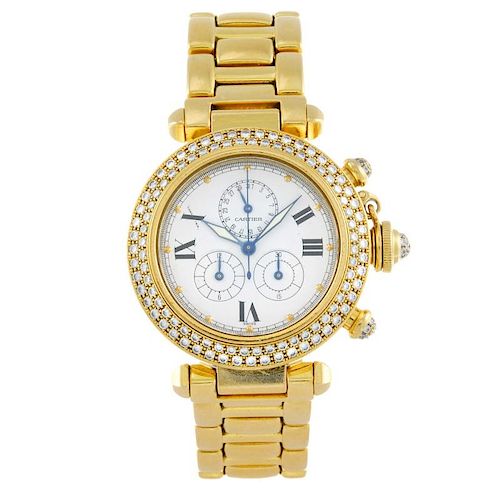 CARTIER - a Pasha de Cartier chronograph bracelet watch. Factory diamond set 18ct yellow gold case w