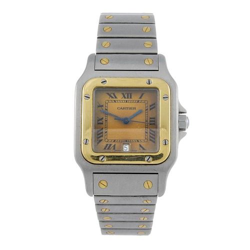 CARTIER - a Santos bracelet watch. Stainless steel case with yellow metal bezel. Reference 187901, s