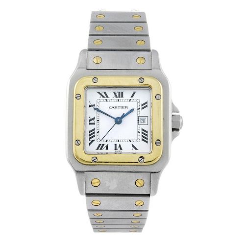 CARTIER - a Santos bracelet watch. Stainless steel case with yellow metal bezel. Numbered 296175575.