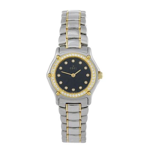 EBEL - a lady's 1911 bracelet watch. Stainless steel case with factory diamond set yellow gold bezel