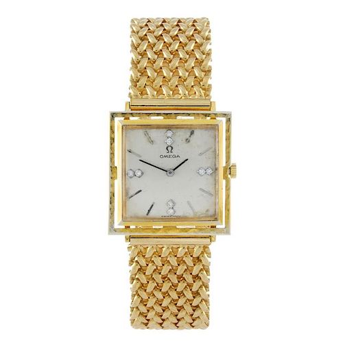 OMEGA - a gentleman's bracelet watch. Yellow metal case, stamped 14k. Numbered D6650, 669488. Signed