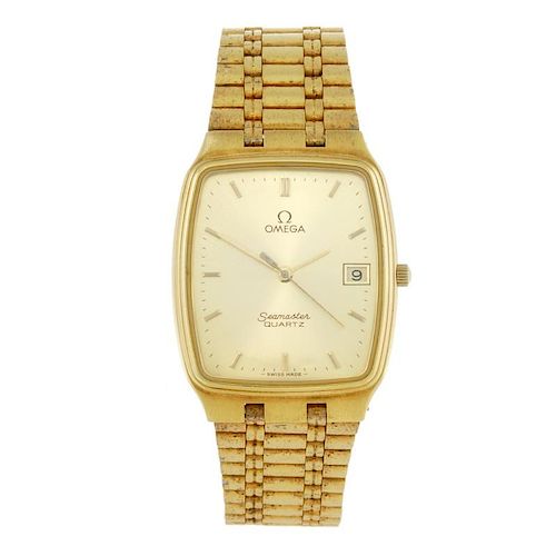OMEGA - a gentleman's Seamaster bracelet watch. Gold plated case with stainless steel case back. Num