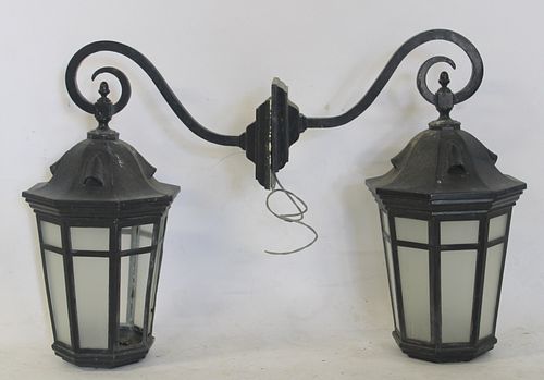 An Antique Pair Of Patinated Metal Lanterns With