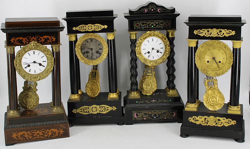 4 Antique Column Form Clocks.