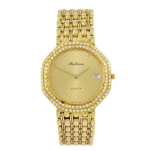 BASKANIA - a gentleman's bracelet watch. Factory diamond set yellow metal case, stamped 0,750. Unsig