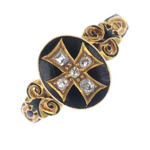 A mid Victorian 18ct gold diamond and enamel memorial ring. The old-cut diamond cross and black enam