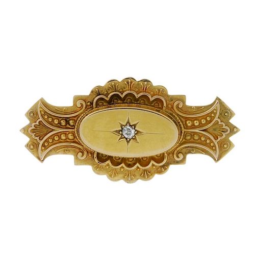 A late Victorian 9ct gold and diamond memorial brooch. The central oval-shape panel set with a circu