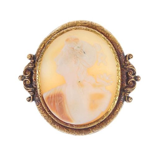 A mid 19th century mounted shell 18ct gold cameo. The oval-shape shell cameo, depicting Flora, to th