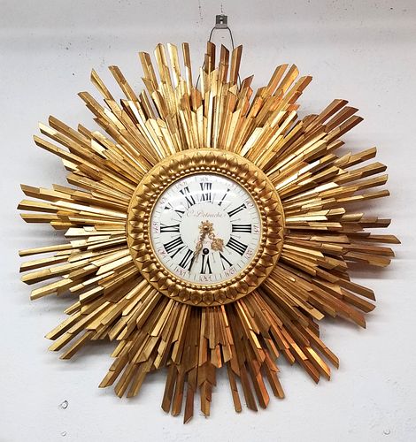 A Louis XVI Style Giltwood Wall Timepiece, In a