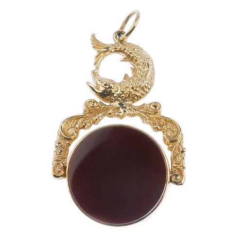 A 9ct gold hardstone swivel fob. Designed as circular bloodstone and carnelian panels to the 9ct gol