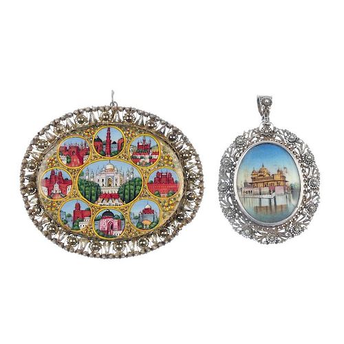 Two items of Indian jewellery. Both of oval outline with filigree surrounds, the first a pendant wit