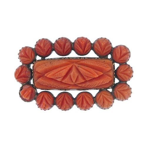 Three items of coral jewellery. To include a mid Victorian carved coral memorial brooch, designed as
