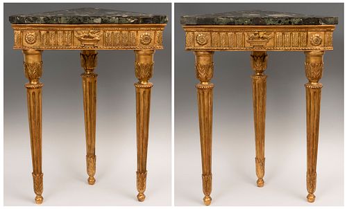 Pair of Louis XVI style consoles; Rome, last third of the eighteenth century.
Carved and gilded wood and original green marble veneer.