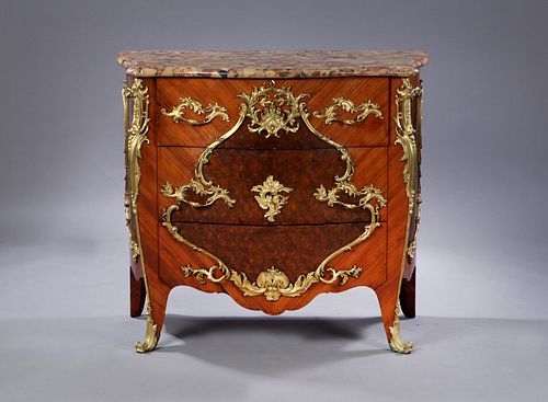 FRANCOIS LINKE (1855-1946); Rococo style commode; Paris, c. 1900.
Rosewood, brocatel marble and gilt bronze.