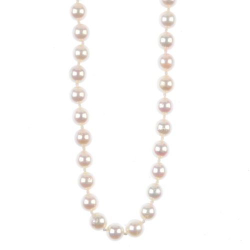 A cultured pearl single-row necklace, with diamond clasp. The cultured pearls, to the single-cut dia
