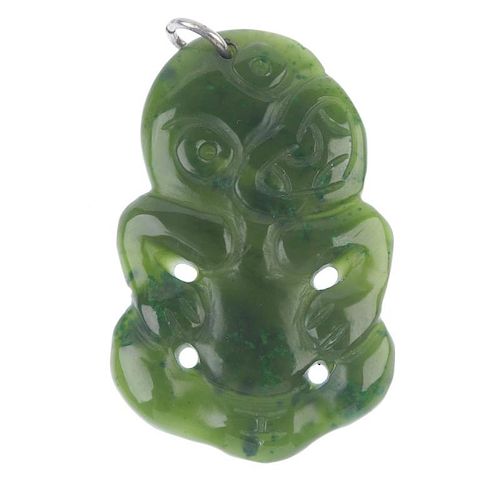 A Maori jade hei-tiki. The Maori jade carved as a typical hei-tiki to the plain surmount loop. Lengt