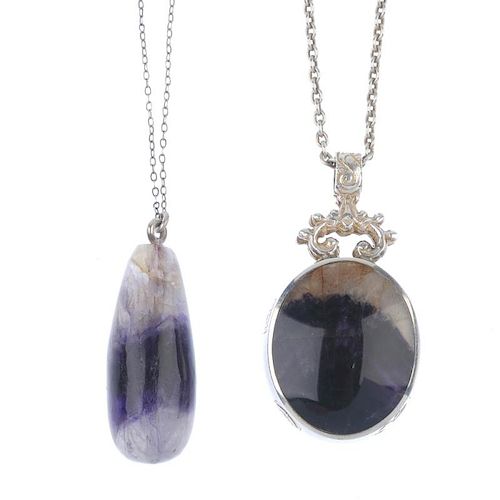 Two Blue John pendants. The first designed as an oval-shape silver pendant set to both sides with Bl