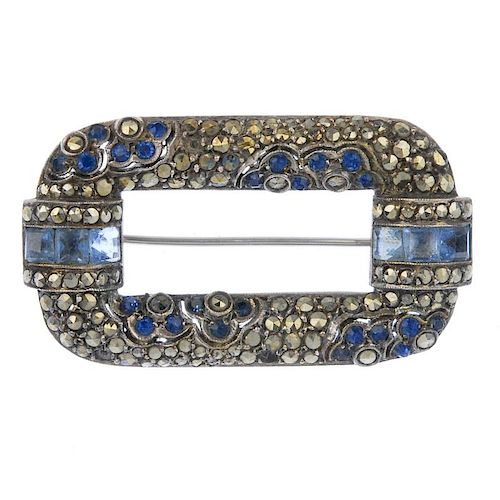 An early 20th century silver marcasite and paste brooch. The rectangular-shape marcasite brooch, wit