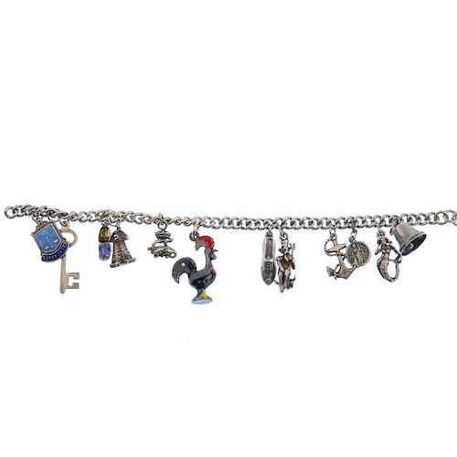 Four charm bracelets. Comprising a total of fifty-one assorted charms. One bracelet and fifteen char