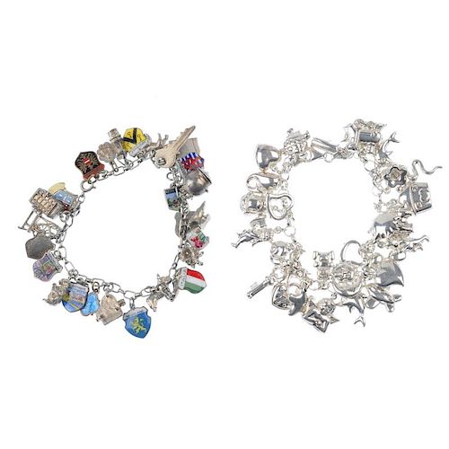 Six charm bracelets. Suspending a total of eighty-nine charms, to include an anvil, a poodle, a pair