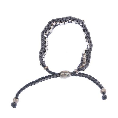 LINKS OF LONDON - a bracelet. The friendship style bracelet with grey cord and bamboo shape silver b