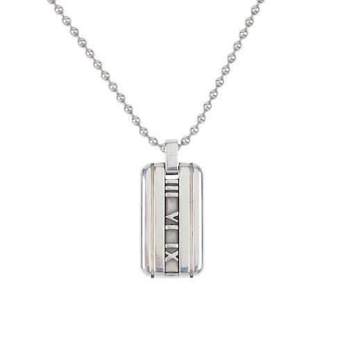 TIFFANY & CO. - a silver 'Atlas' pendant. Designed as a rectangular-shape tag, with signature Roman