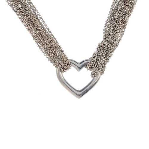 TIFFANY & CO. - a silver necklace. Designed as a central open heart-shape link to the multi-strand s