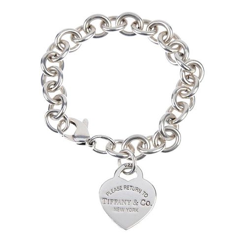 TIFFANY & CO.- a bracelet. The belcher-link bracelet suspending a heart-shape 'Please return to Tiff