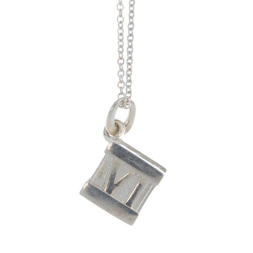 TIFFANY & CO. - a necklace, by Elsa Peretti for Tiffany & Co. Designed as a cube with Roman numeral