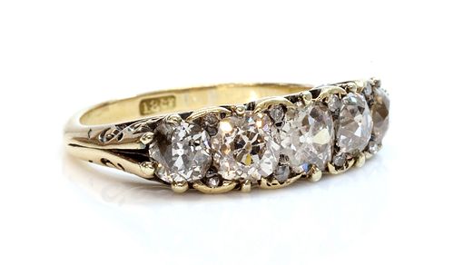 A five stone diamond carved head ring,