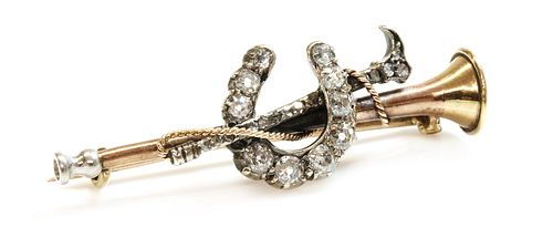 A cased diamond set hunting horn, horseshoe and crop bar brooch, c.1900,