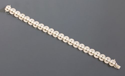 A white gold cultured pearl and diamond bracelet,