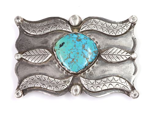 A silver Navajo turquoise set belt buckle, c.1970,