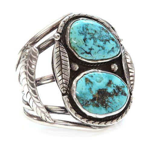 A silver Navajo turquoise set torque bangle or cuff,