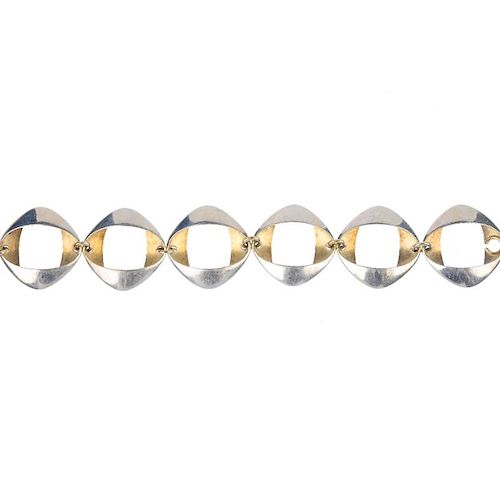 GEORG JENSEN - a silver bracelet. Comprising a series of six bi-colour oval-shape links, to the bead