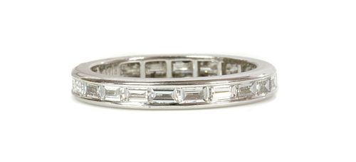 An 18ct white gold diamond set full eternity ring,