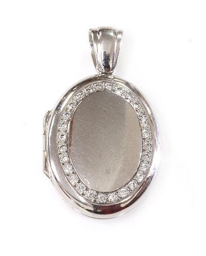 An 18ct white gold diamond set hinged locket, by Charles Green,