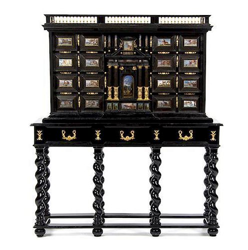 * An Italian Baroque Eglomise Inset and Gilt Bronze Mounted Ebony Cabinet on Stand, LATE 17TH CENTURY, Height 73 1/2 x width 63