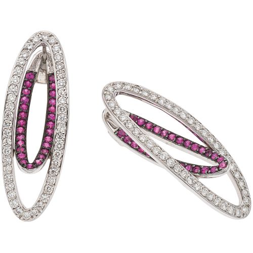 PAIR OF EARRINGS WITH RUBIES AND DIAMONDS IN 18K WHITE GOLD Round cut rubies ~1.60 ct, Brilliant cut diamonds ~2.40 ct